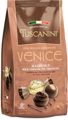 Tuscanini Milano milk chocolate truffle on a plate, a luxurious afternoon treat.