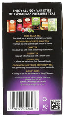 Twinings Blackcurrant Breeze tea bag steeping reveals bold flavor.