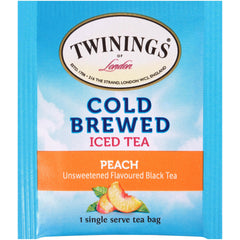 Peach cold brew tea bags in a pitcher, ready to chill.