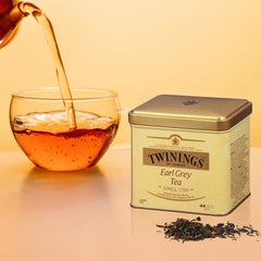 Twinings English Breakfast loose tea with premium quality and robust flavor.