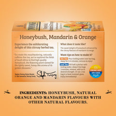 Twinings Honeybush Mandarin Orange tea bags steeping, yielding a bright herbal cup with fruit-forward notes.