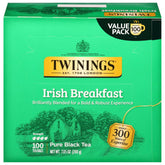 Twinings Irish Breakfast tea bags pour into a cup for a bold morning brew.