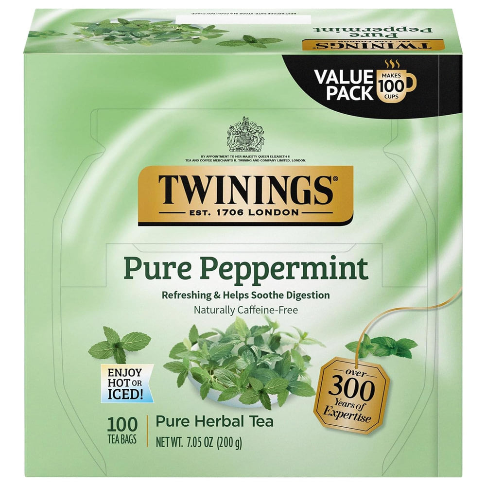 Twinings Pure Peppermint tea bags in a cup deliver fresh mint aroma.