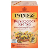Twinings Pure Rooibos tea bags close-up showing copper-red infusion and caffeine-free warmth.