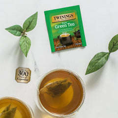 Twinings tea organizer inside the wooden chest keeps bags accessible