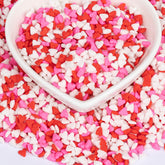 Twisweet mini heart sprinkles in pink-red-white mix for cake decorating.
