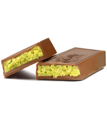 UNIQBITE Mini Dubai Pistachio Bar pistachio cream close-up highlights creamy filling for gourmet bites.