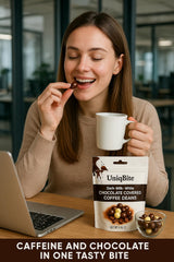 Close-up of whole roasted coffee beans coated in triple chocolate.