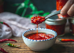 Unpretentious ground cayenne pepper label close-up with gluten-free seasoning note