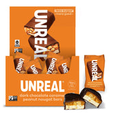UNREAL dark chocolate peanut caramel nougat bar close-up, satisfying snack on the go.
