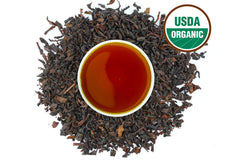 US Wellness Naturals Earl Grey loose leaf close-up highlighting bergamot aroma and quality leaves.