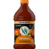 V8 Hot Honey bottle pour for a spicy-sweet sip and versatile kitchen use.