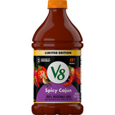 V8 Spicy Cajun 46oz bottle on counter highlighting bold vegetable flavor for meals.