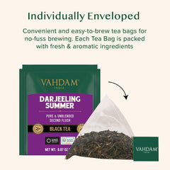 VAHDAM Darjeeling tea bags brewing in a cup with rich, full-bodied flavor.