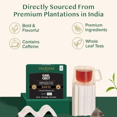 VAHDAM full-leaf black tea leaves unfurling in pyramid bags for rich flavor