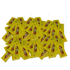 Valentina Mexican Hot Sauce bottle pour adds citrus heat to snacks.