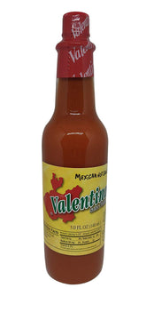 Valentina Salsa Red Hot Sauce bottle for bold chips and meals.