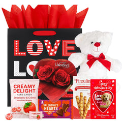 Valentine's gift basket teddy red: cuddly keepsake next to heart-shaped chocolates for romance.