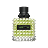 Valentino Donna Born In Roma Green Stravaganza bottle on display, vibrant daytime fragrance