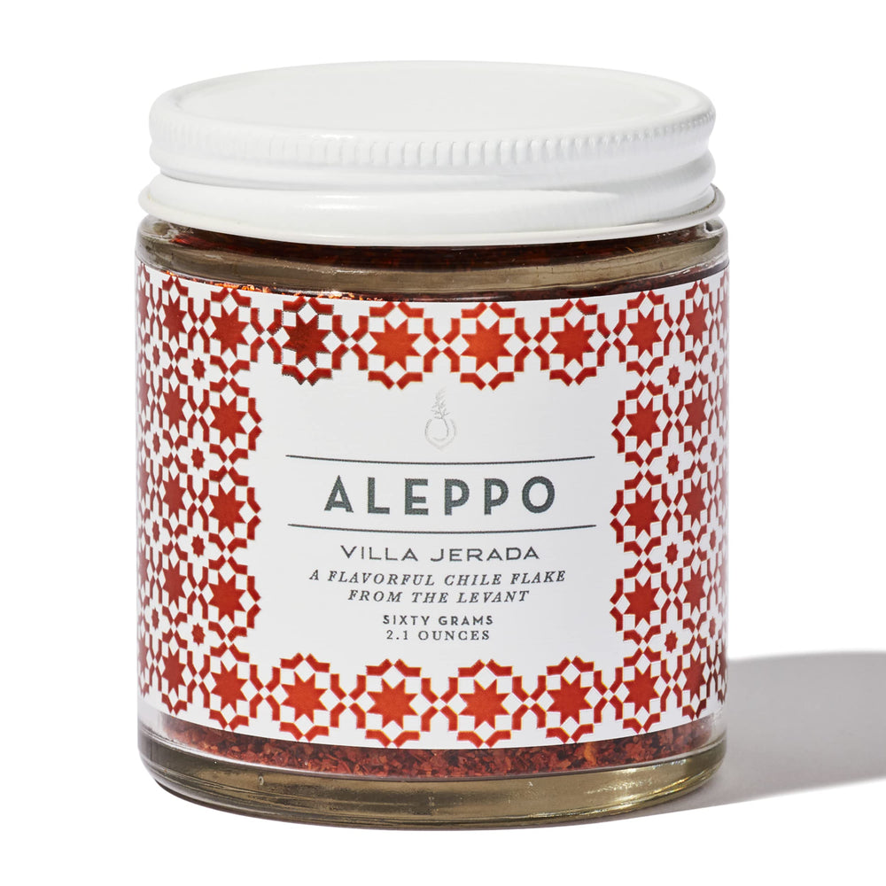 Villa Jerada Aleppo Pepper jar closeup showing mild heat and fruity aroma.
