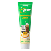 Vinamilk condensed creamer tube pouring over espresso for smoother coffee aroma