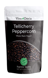 Viva Doria Tellicherry peppercorns close-up, highlighting large size and vibrant citrus aroma for rich flavor.