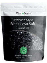 Viva Doria bottle of Hawaiian black lava sea salt with deep black crystals for finishing dishes.