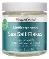 Viva Doria Mediterranean sea salt flakes bottle close-up shows delicate crystals for finishing dishes.