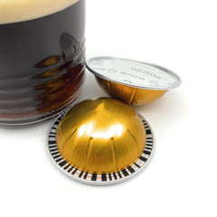 Voltesso espresso poured into a cup with golden crema and balanced aroma.
