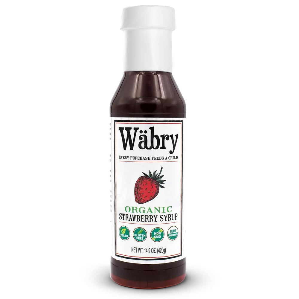 Wäbry Organic Strawberry Syrup bottle closeup, rich color, ideal for topping pancakes