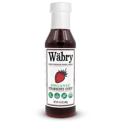 Wäbry Organic Strawberry Syrup bottle closeup, rich color, ideal for topping pancakes