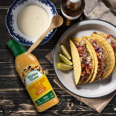 Walden Farms drizzle on veggies with queso flavor and no added sugar.