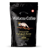 Wallacea Kopi Luwak beans in an 8oz pack, rich aroma ready to brew.