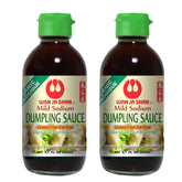 Wan Ja Shan Organic Dumpling Sauce bottle being poured, highlighting clean, gluten-free goodness.