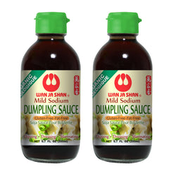 Wan Ja Shan Organic Dumpling Sauce bottle being poured, highlighting clean, gluten-free goodness.
