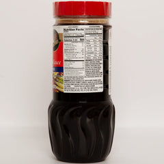 Wang Bulgogi Sauce bottle being poured to glaze beef