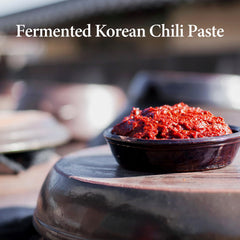 Wang gochujang spooned into a bowl for stir-fries and bowls.