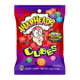 Warheads Cubes orange flavor close-up, tangy bite-sized candy for on-the-go snacking.