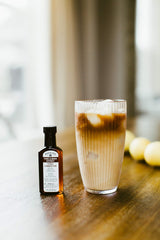 Watkins Almond Extract in a bright kitchen scene showing versatility in baking.
