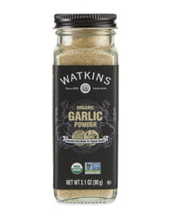 Watkins Garlic Powder bottle on a shelf, quick flavor access for meals.
