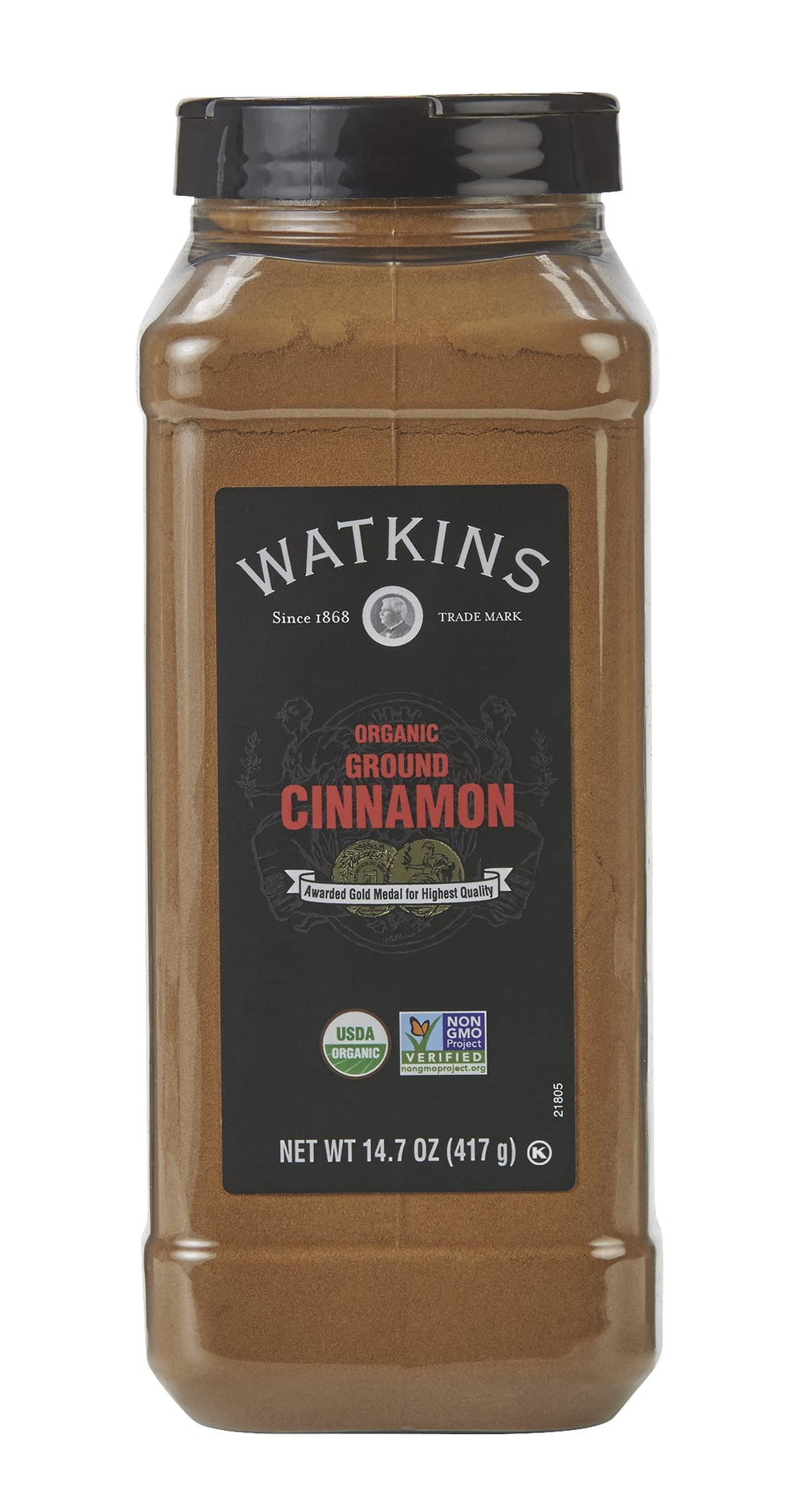 Watkins Organic Ground Cinnamon on spoon, warm aroma for baking