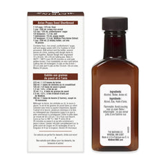 Watkins Pure Anise Extract pouring into a bowl for aromatic flavor.