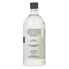 Watkins lemon extract bottle pour shot for bright citrus flavor.