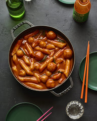 We Rub You gochujang glaze on a stir-fry, adds depth.