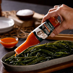 Weber Buffalo Trace hot sauce on plated dish for bold finish.