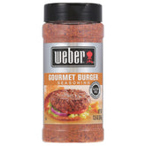 Weber Gourmet Burger Seasoning bottle close-up, adds savory depth to grilled burgers.