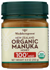 Wedderspoon Manuka Honey 100+ MGO jar with creamy texture, perfect for tea and toast.