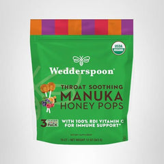Wedderspoon Manuka Honey Lollipops closeup of ingredients featuring organic cane syrup and Vitamin C.