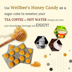 Wellbee's Pure Honey Candy drops in tea setup illustrate versatile, natural sweetening option.
