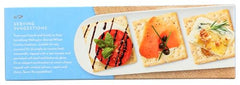 Wellington Cracker Stoned Wheat with tomato and cottage cheese topping.